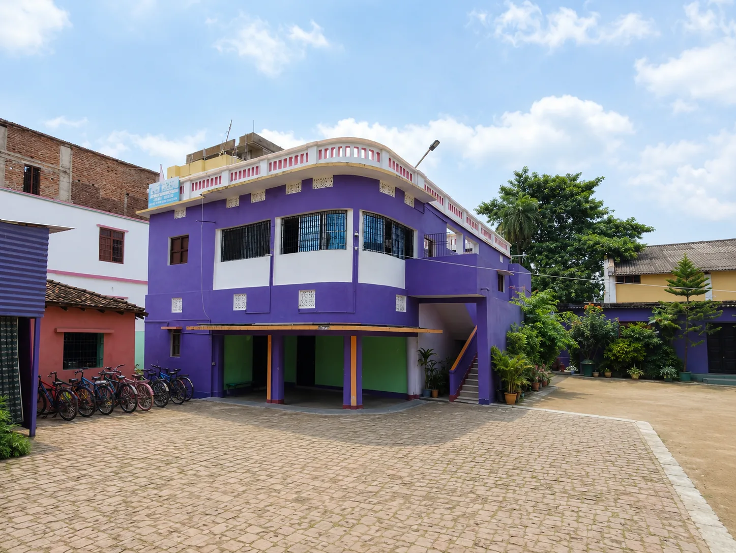 Purple school building and courtyard